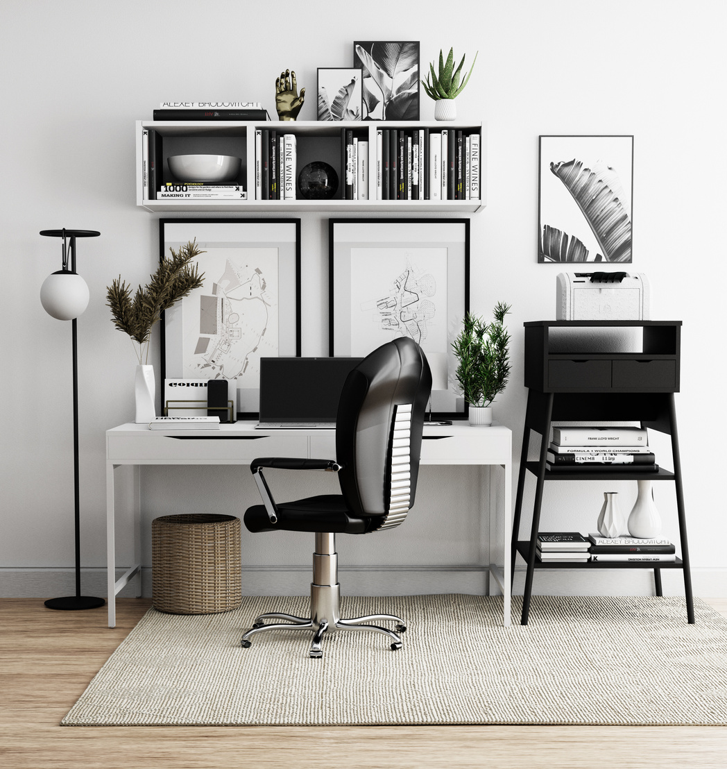 Black Office Rolling Chair Beside White Wooden Desk